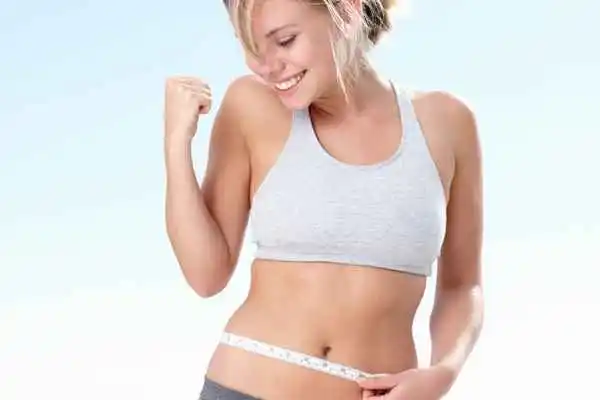 woman happy after fat reduction treatment Northamptonshire