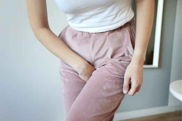 older woman running to the toilet because of urinary incontinence Northamptonshire