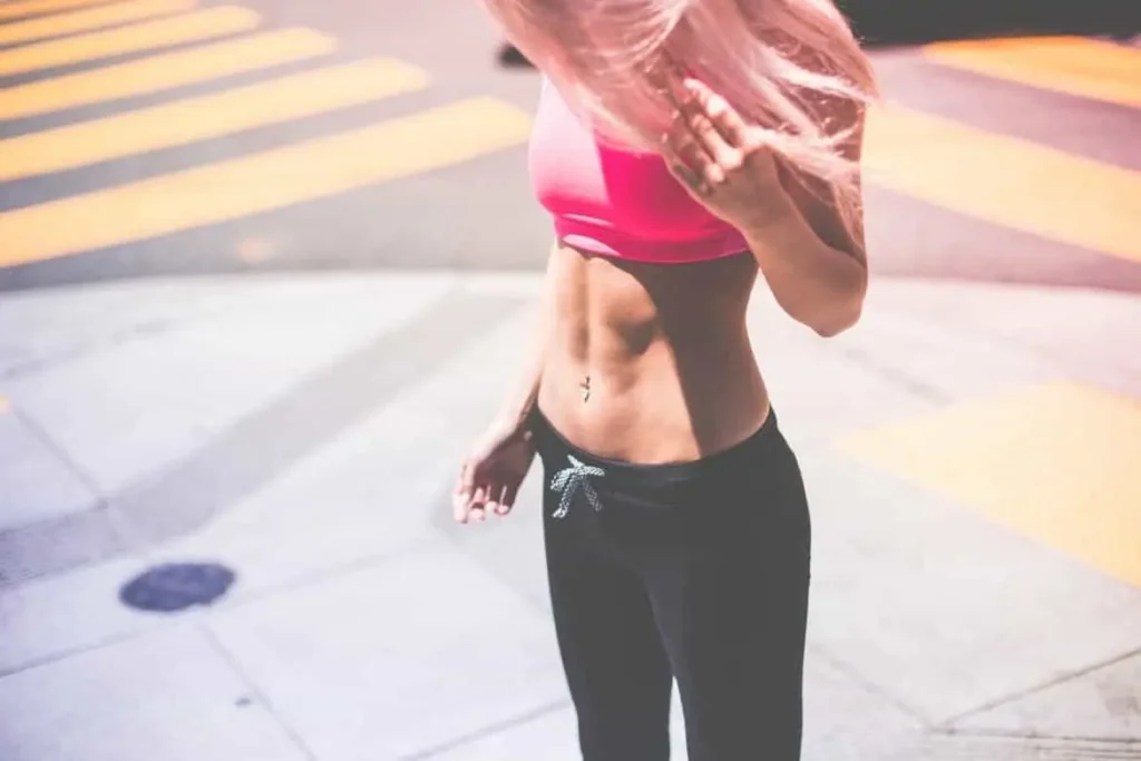 Woman with toned stomach after LA-EMS Body Sculpting Treatment Northamptonshire